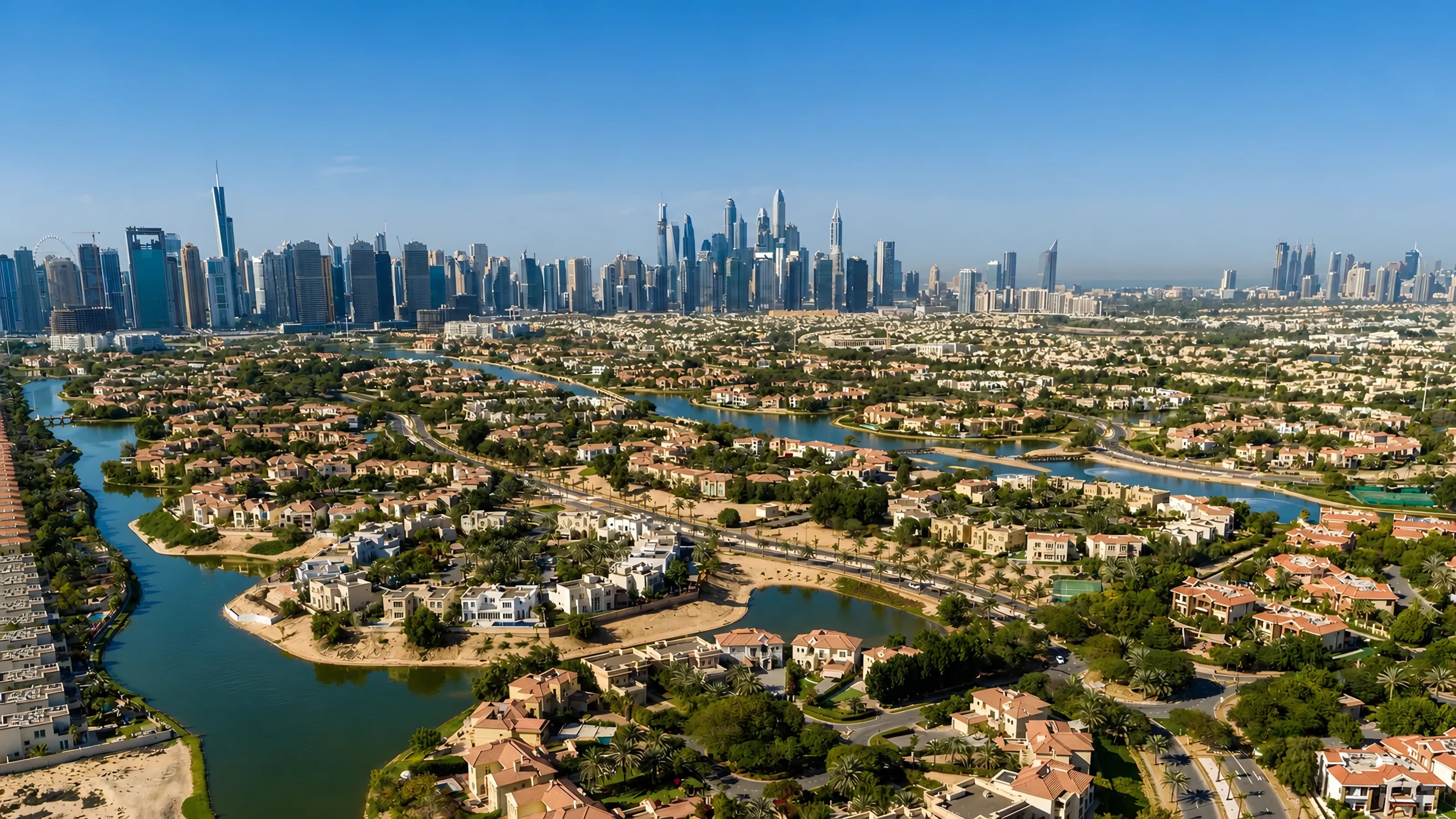 Jumeirah Islands from the air, its lakes running towards the Dubai Marina skyline