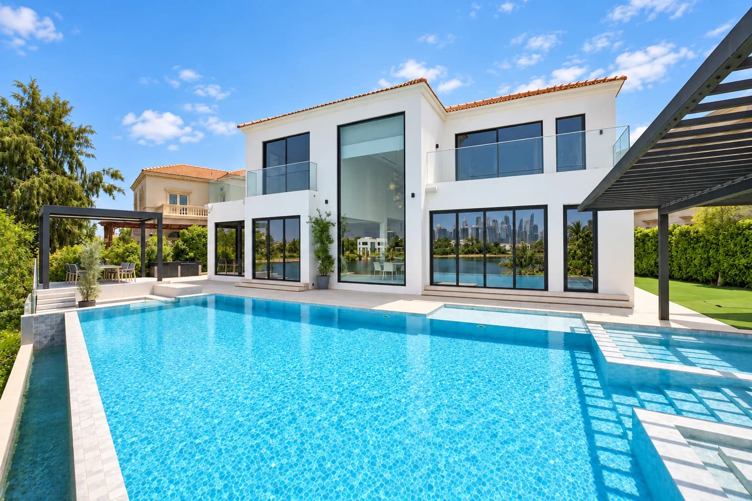 Renovated Jumeirah Islands villa overlooking its pool